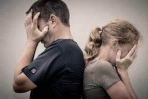 portrait of unhappy couple not speaking after having dispute. concept of unhappiness family.